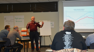 Dr. Jeff Savell, Texas A&M University distinguished professor in the department of animal science, leads a discussion on beef cuts for barbecue during a recent barbecue town hall meeting at Texas A&M University in College Station. (Texas A&M AgriLife Extension Service photo by Blair Fannin)