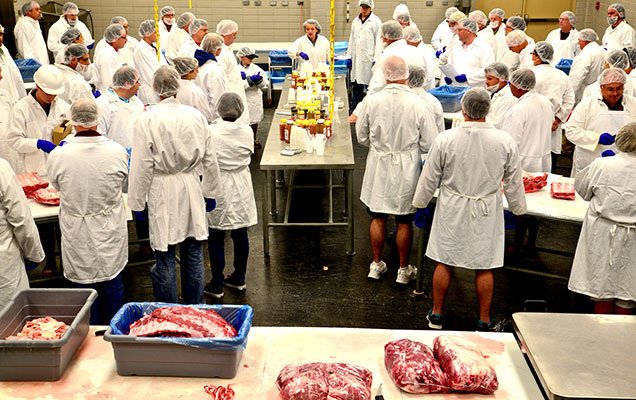 People in a barbecue meat class