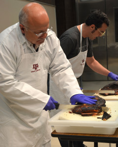 Dr. Jeff Savell demonstrating brisket slicing methods.
