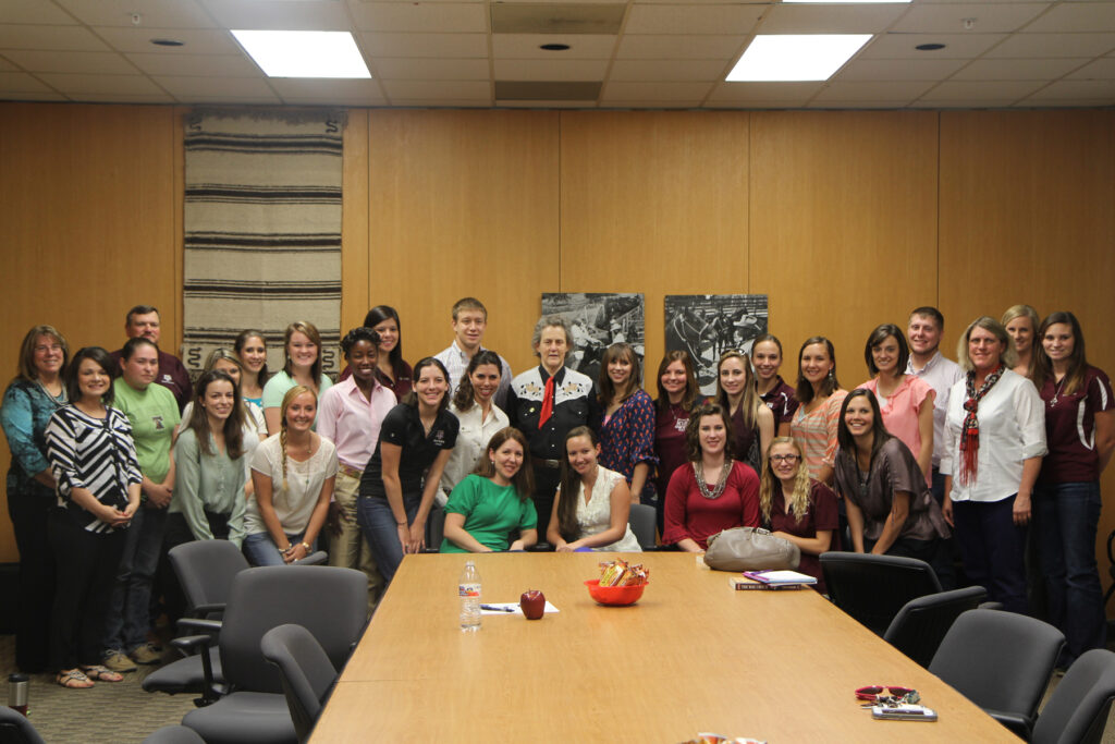Group of students with Dr. Temple Grandin in the Animal Science conference room