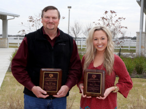 Ray Riley, left, and Amber Skinner, right, holding their awards.