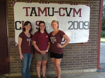 Mary Anne and classmates. They are standing in front of a TAMU-CVM Class of 2009 sign.