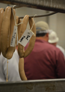 Sausages hanging on a rack