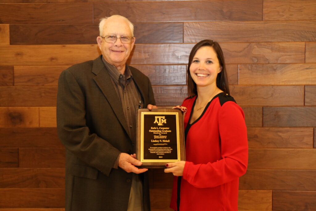 Lindsey Mehall, right, standing with Dr. Zerle Carpenter
