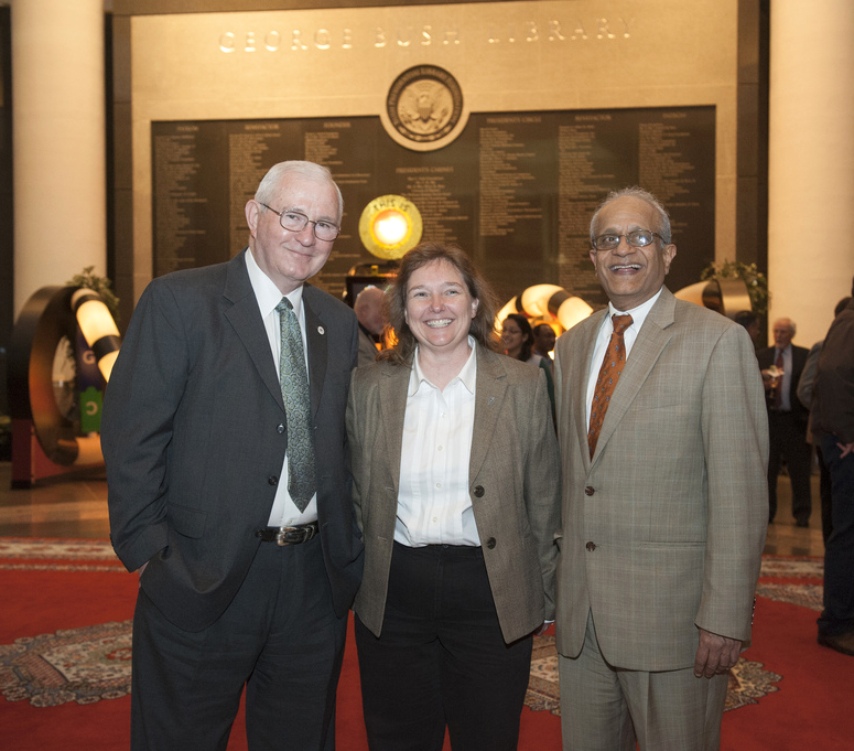 Dr. Russell Cross, professor and head of animal science, Penny Riggs, and Dr. Sonny Ramaswamy, administrator of the National Institute of Food and Agriculture, at the grand opening of the exhibit “Genome: The Secret of How Life Works” in 2012.