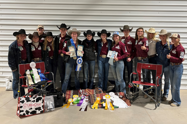 The Texas A&M Ranch Horse Team standing with their awards.