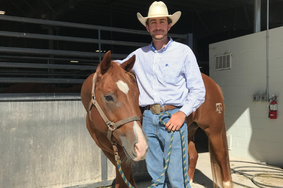 man posing next to a horse