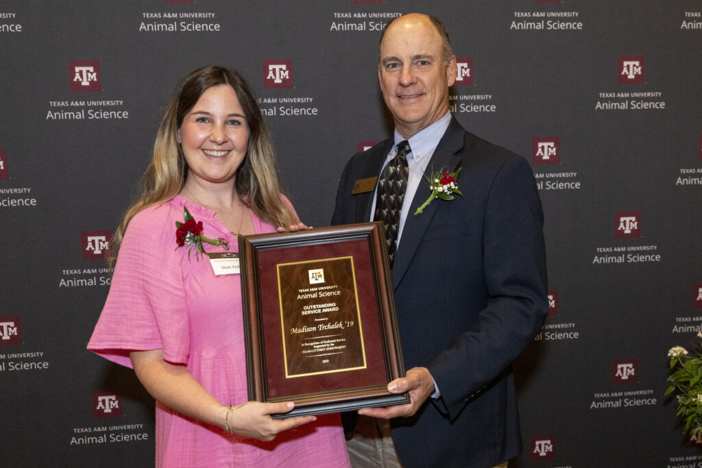 Clay Mathis, Ph.D., Department of Animal Science professor and department head, and Madison Trchalek on Friday, Apr 25, 2025, in College Station, Texas.