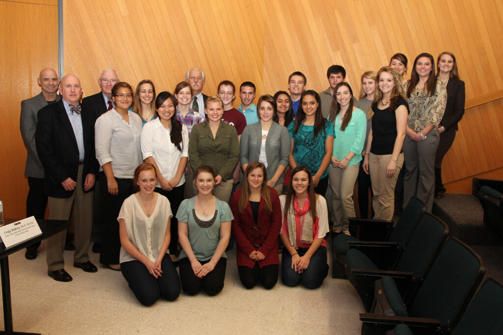 Students and faculty members standing for a photo.