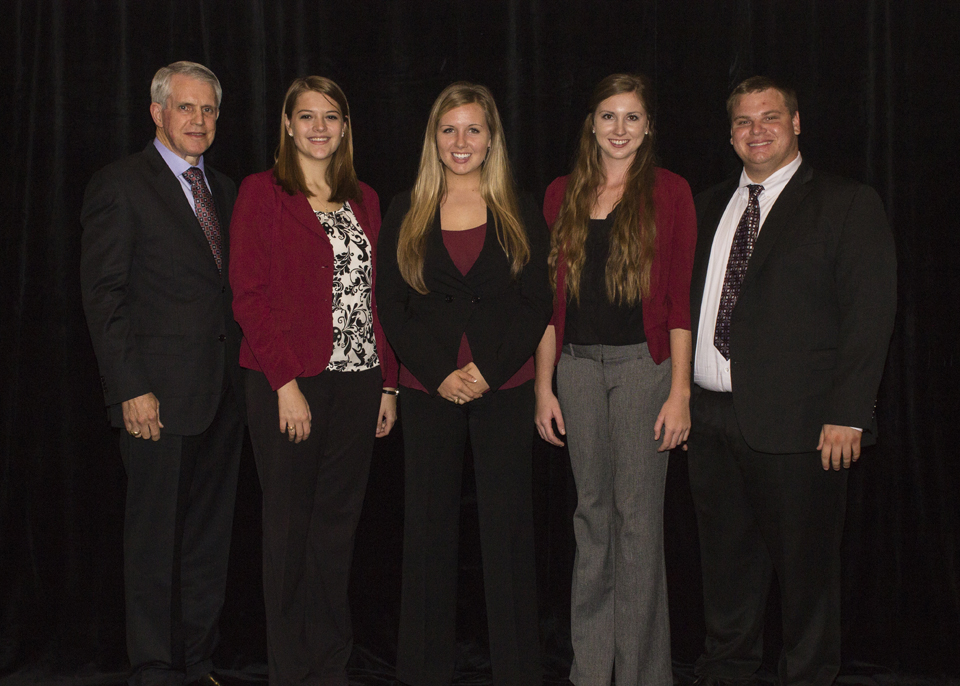 Members of the Quiz Bowl team stand for a photo.