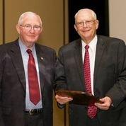 Dr. H. Russell Cross, professor and head of the Department of Animal Science at Texas A&M University with Dr. Zerle Carpenter.