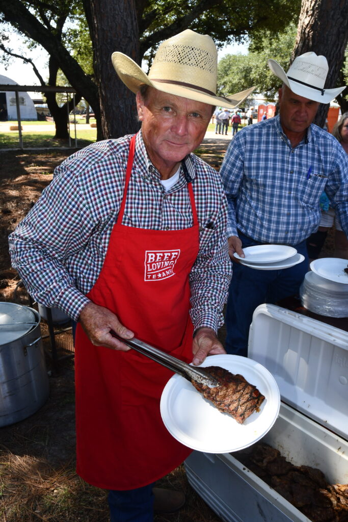 Mark Currie with steak on a plate.