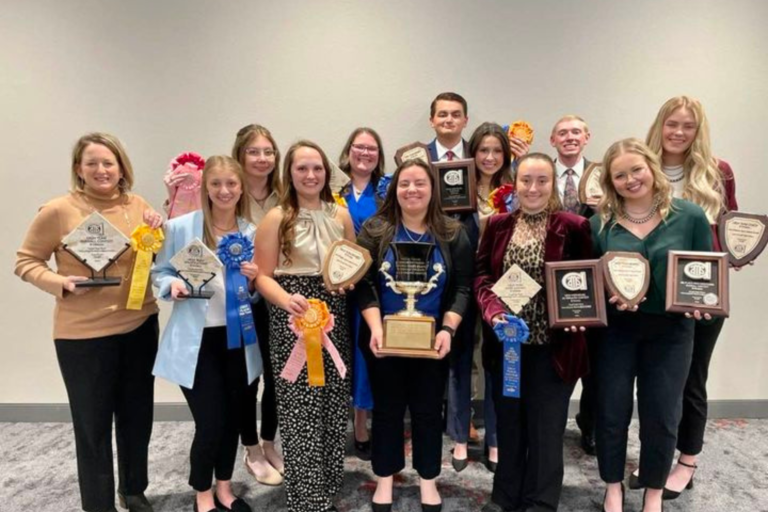 The Fightin' Texas Aggie Meat Judging Team with their awards.
