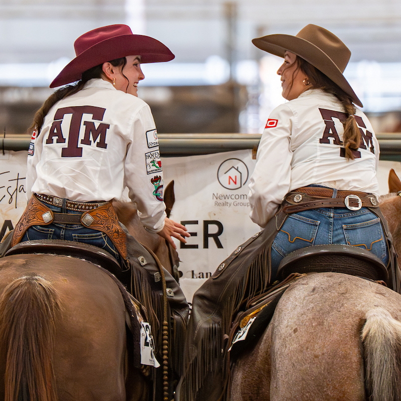 two female students on horses 